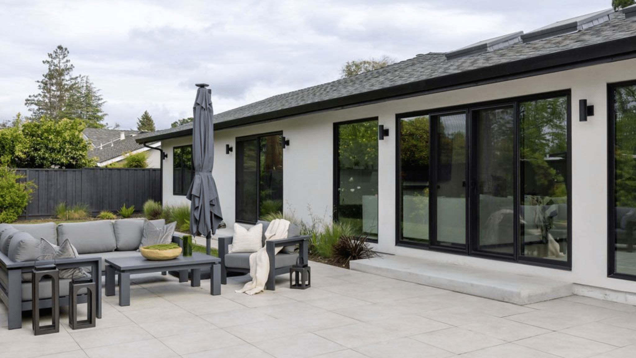 Backyard ADU with a small patio suggesting rental income potential for homeowners